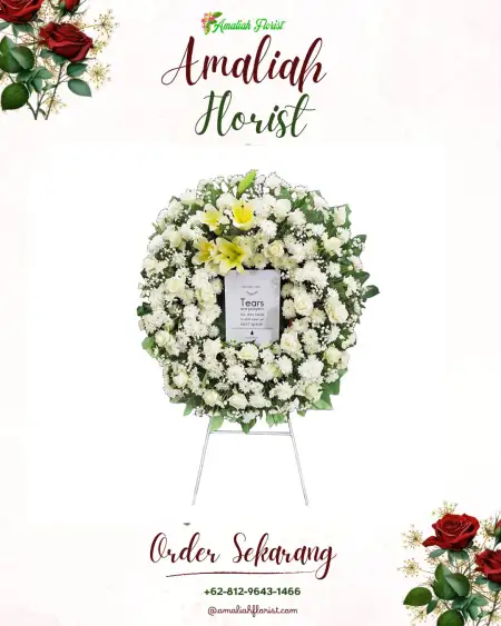 Krans Bunga Duka Lesung Batu Muda